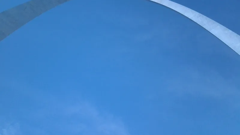The Gateway Arch against a clear blue sky