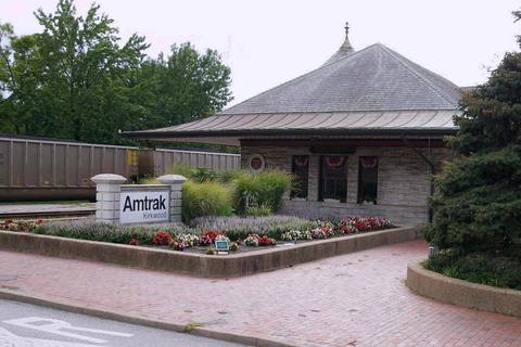 The stone Kirkwood train station and its flower beds, a landmark stop in St. Louis County.